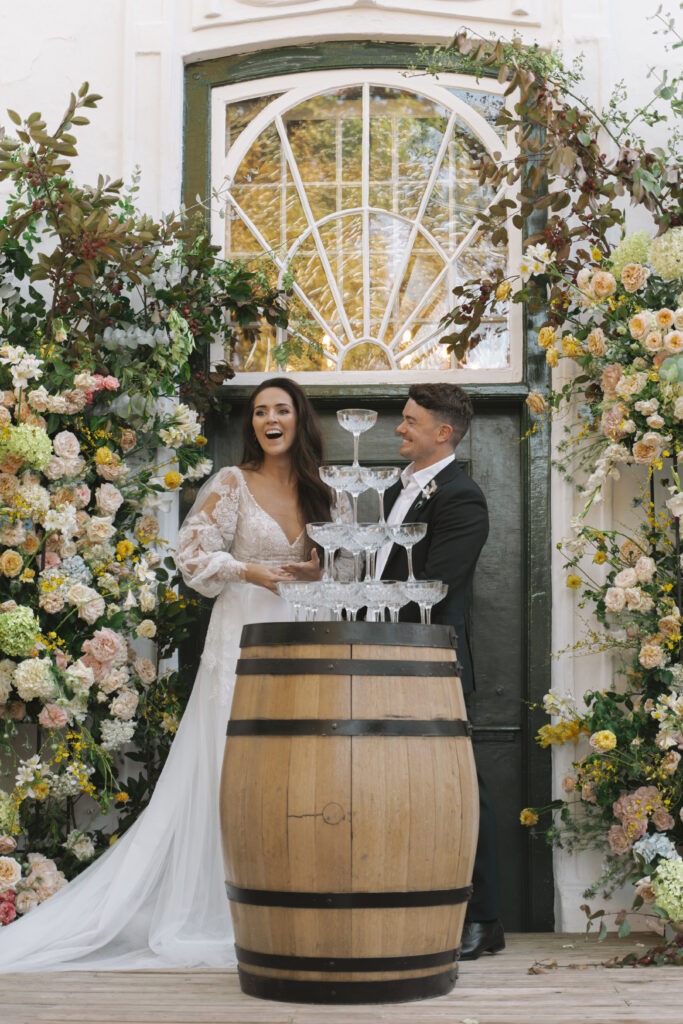 Bride and groom laughing at their luxury wedding in Cape Town Wineland's