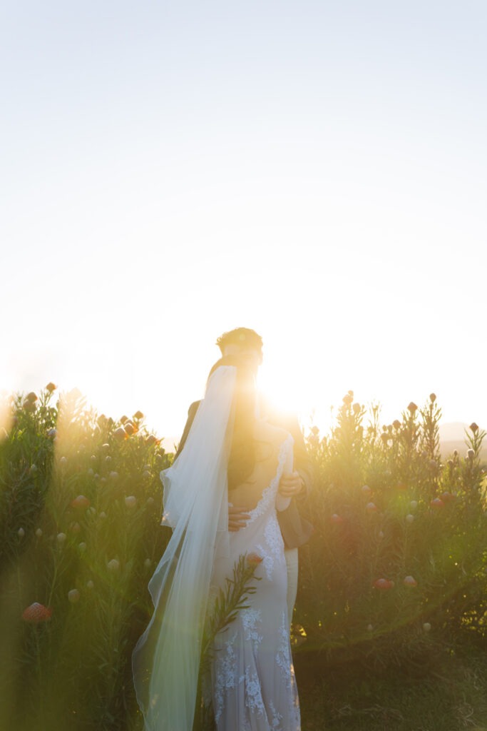 Bride and groom at sunset