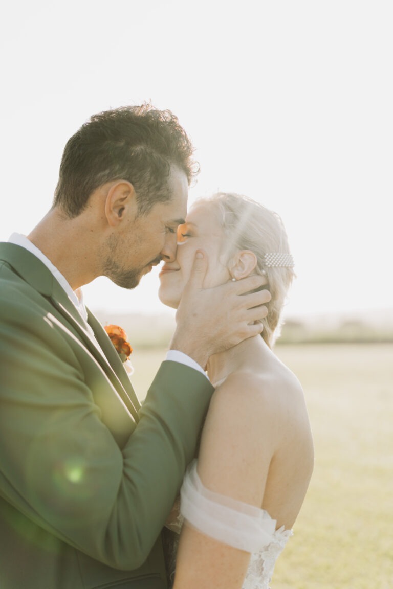 Bride and groom kissing