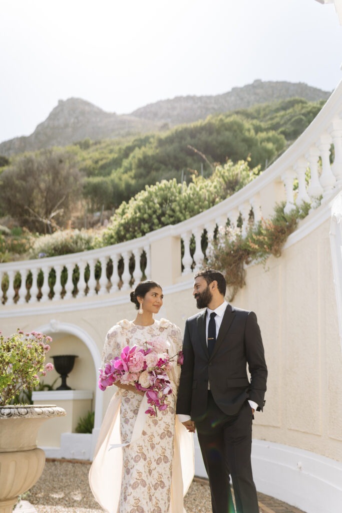 Luxury editorial-meets-candid wedding photography of bride and groom in Cape Town
