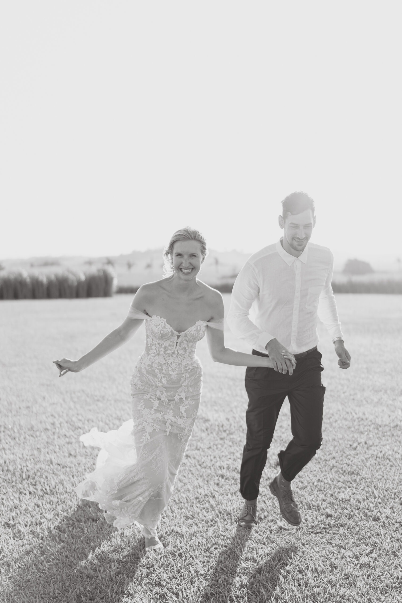 Happy bridal Couple running