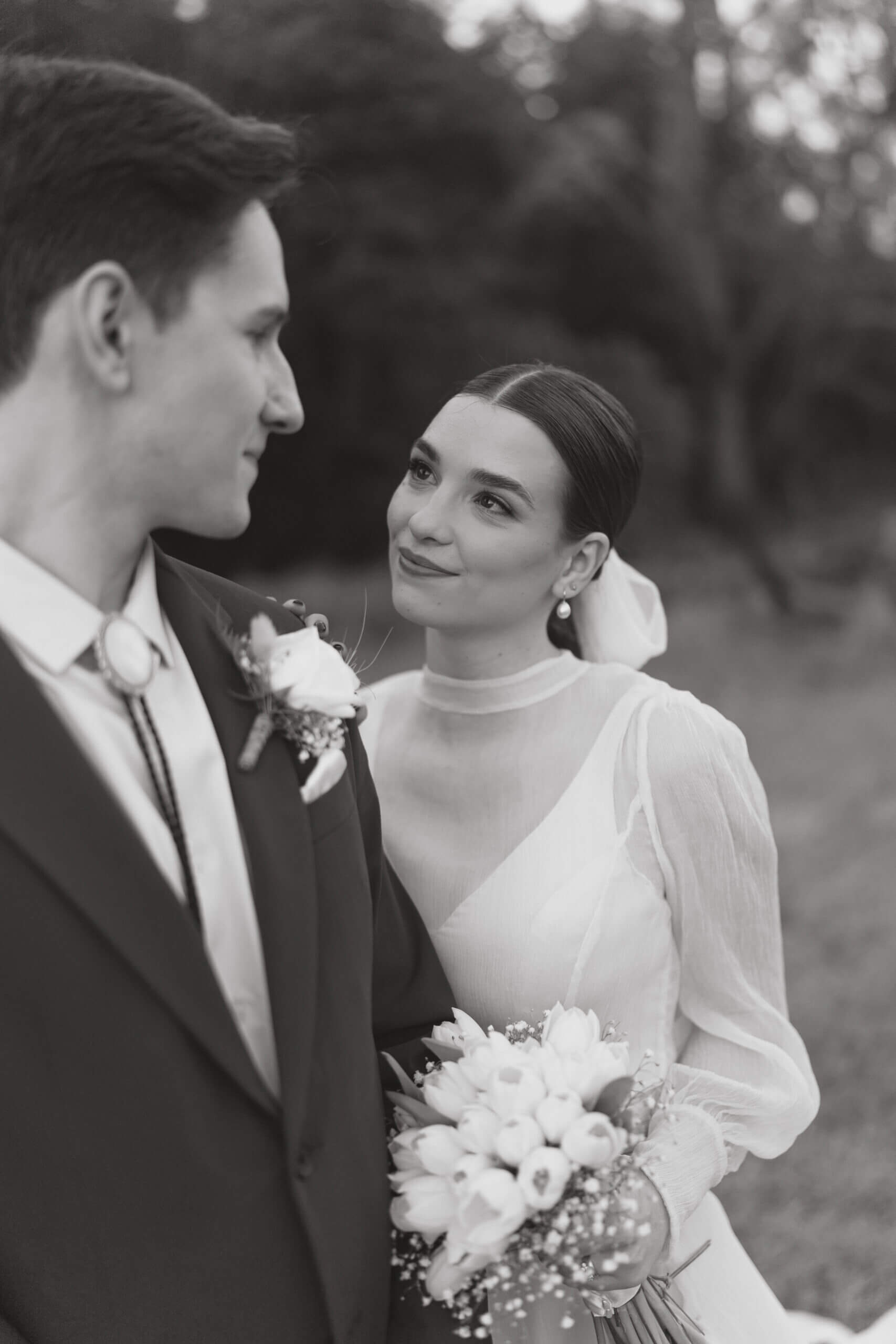 Trendy bride looking at groom in Cape Town