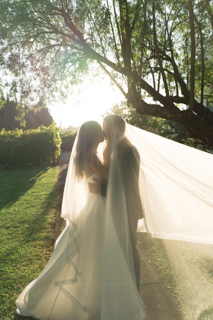 Editorial natural light photography of bride and groom at Au d' Hex Estate in Western Cape Winelands