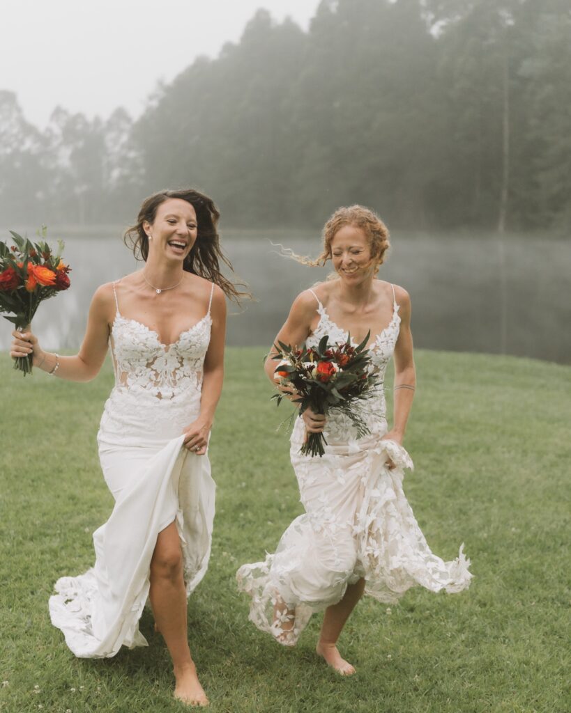 Fun LGBTQ+ couple running in rain just outside of Cape Town in Elgin, Western Cape,