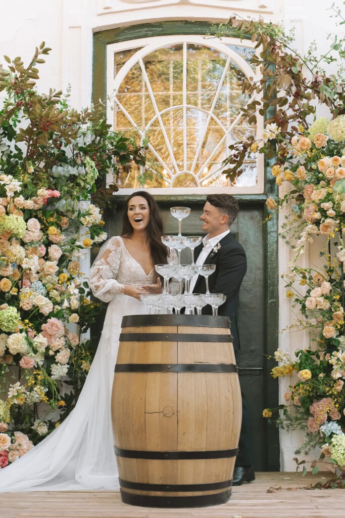 Bride and groom laughing at their luxury wedding at Boschendal - located in Franschhoek Cape Town Winelands