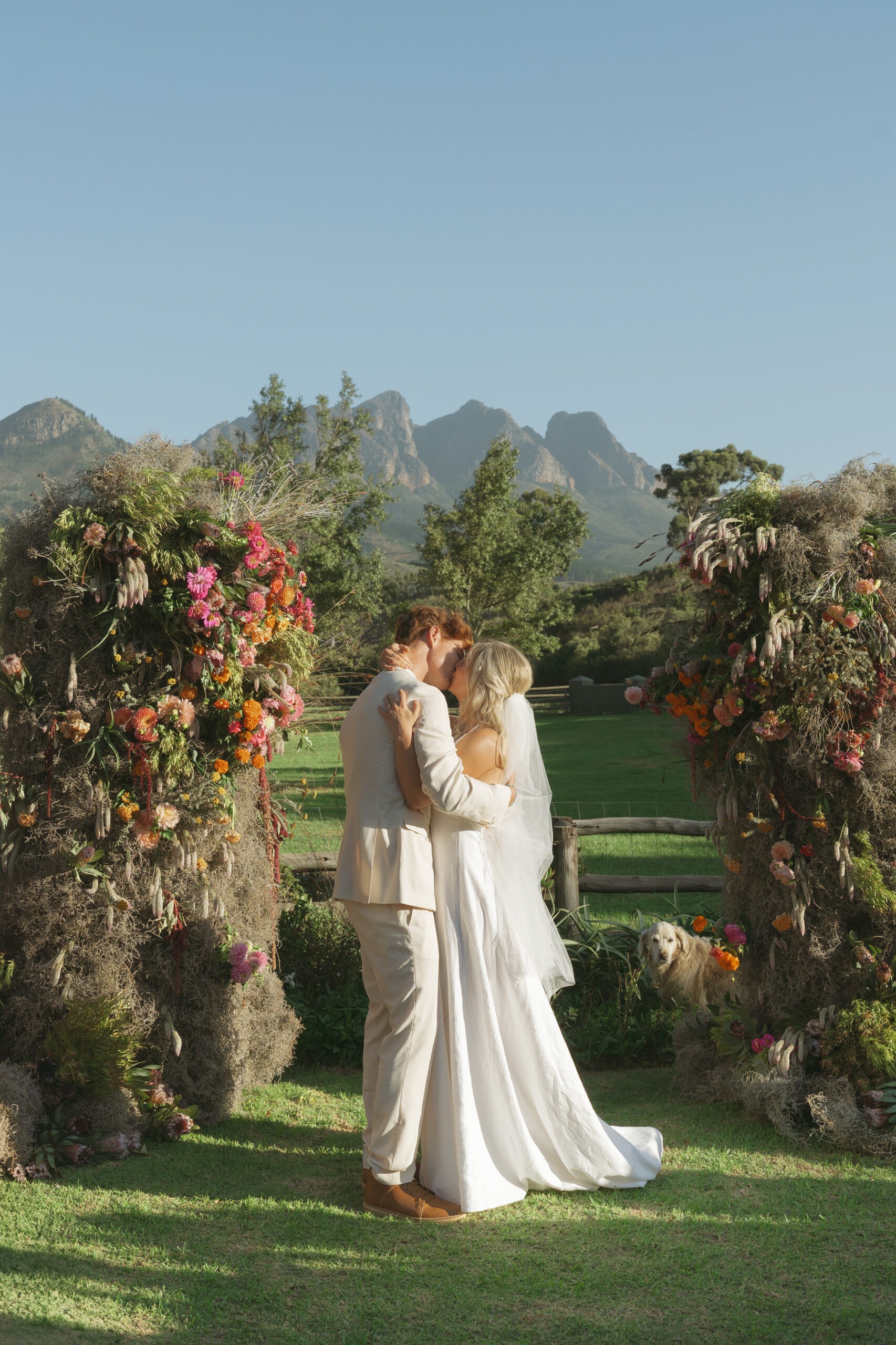 Bridal couple share first kiss in colourful Cape Town wedding