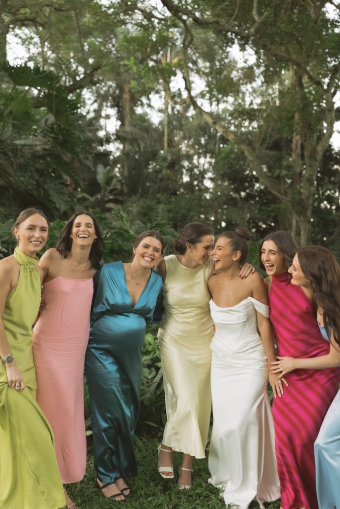 Colourful and candid wedding photography of bride and bridesmaids in Cape Town