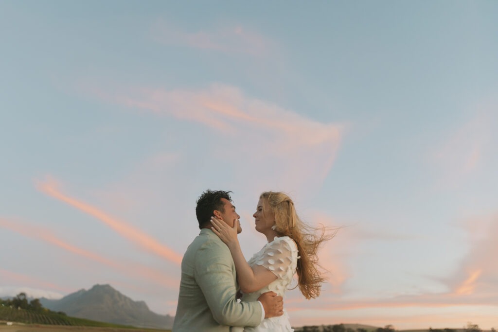 Romantic sunset at Nooitgedacht, Stellenbosch, Cape Town with bridal couple