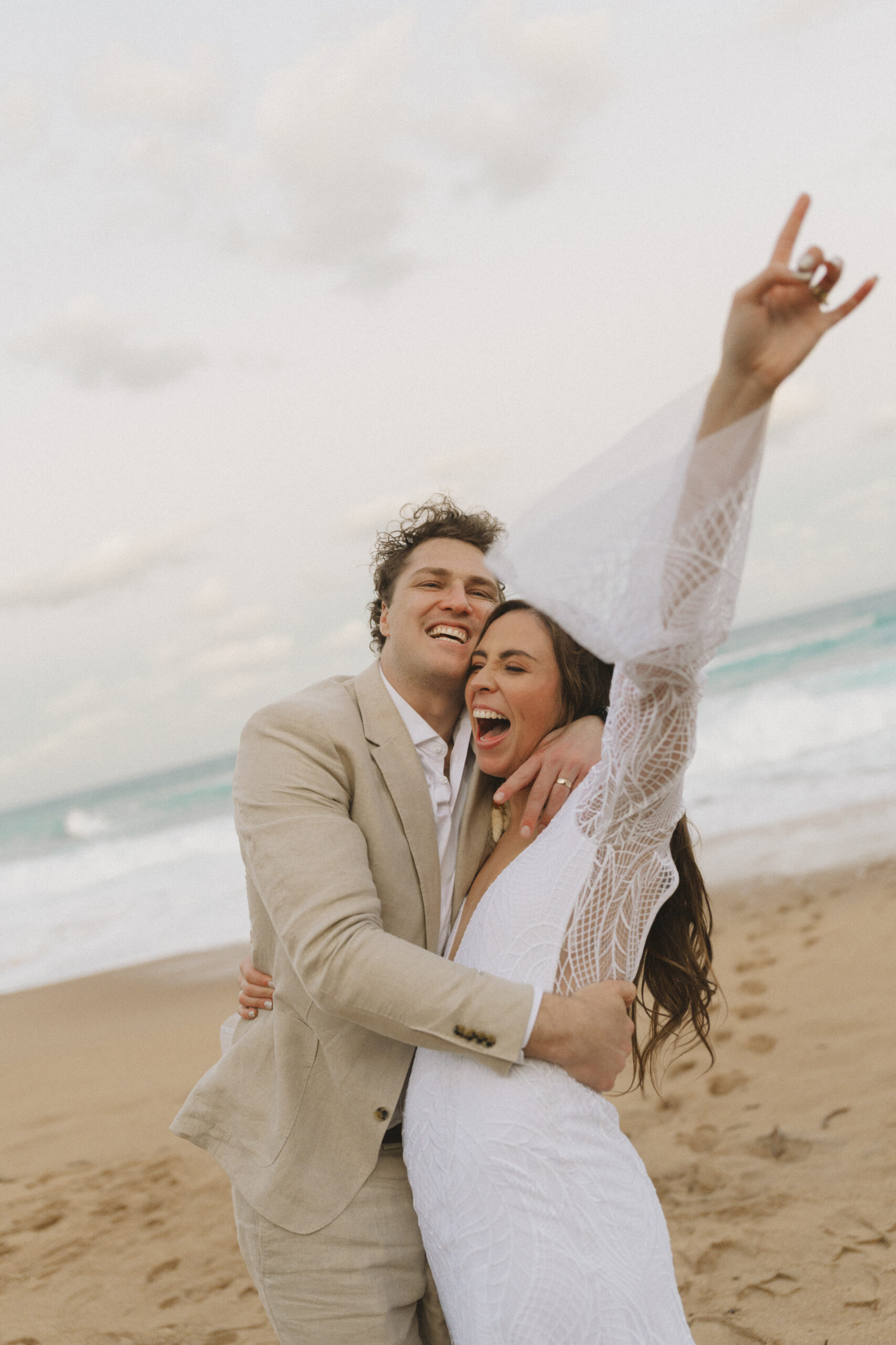 Candid, unposed bridal couple on Cape Town beach