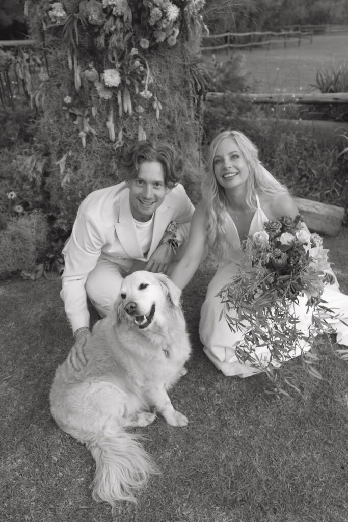 Artsy photography of trendy bride and groom with their dog in Wellington, Western Cape